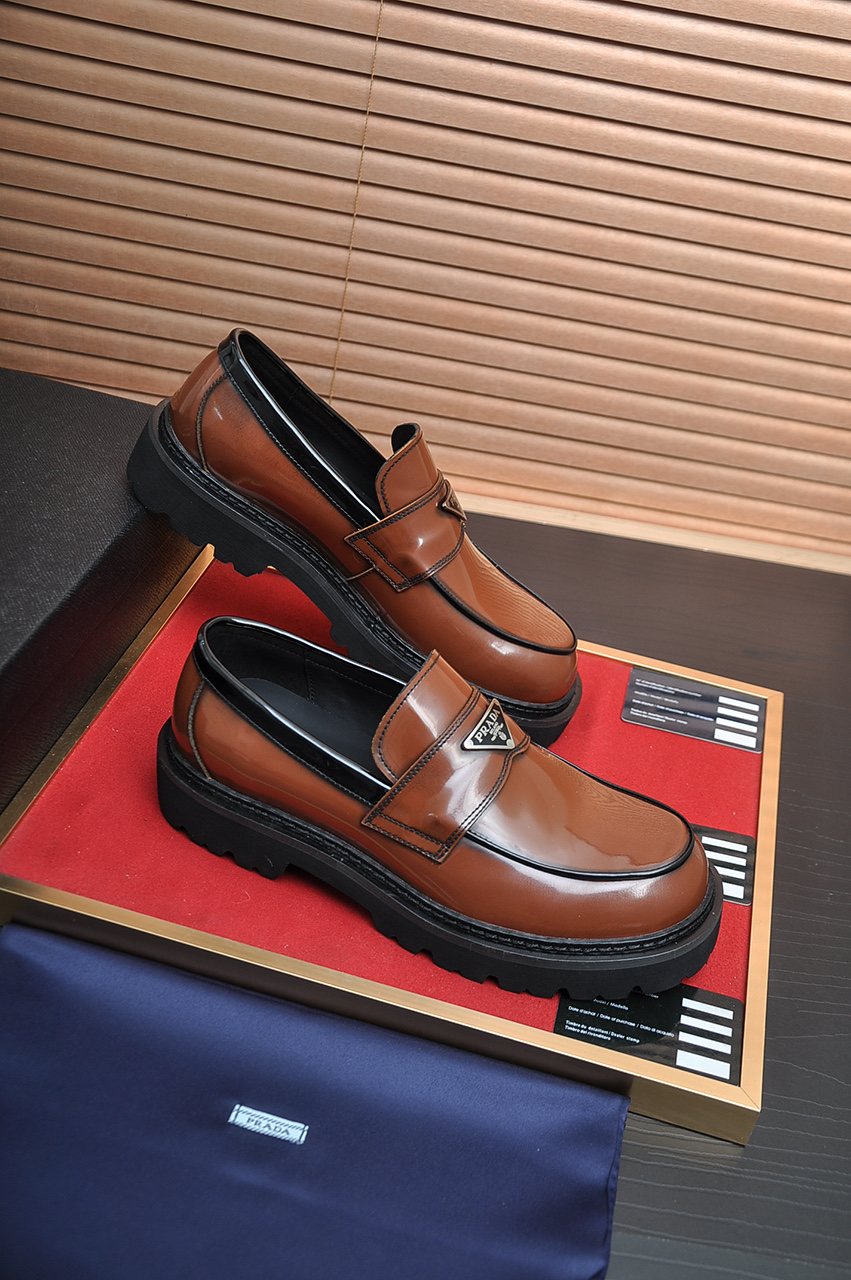 Prada Lug-Sole Strap Loafers