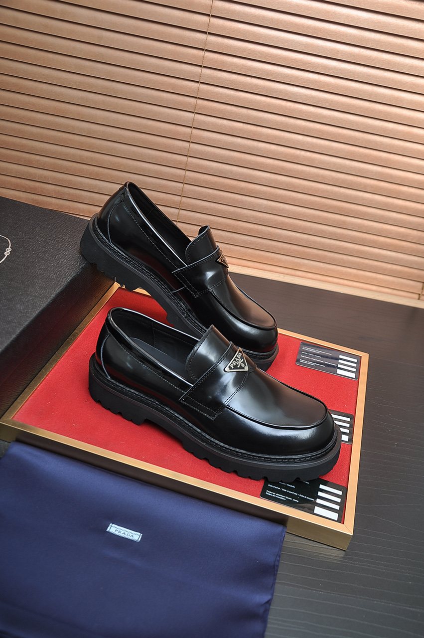 Prada Lug-Sole Strap Loafers