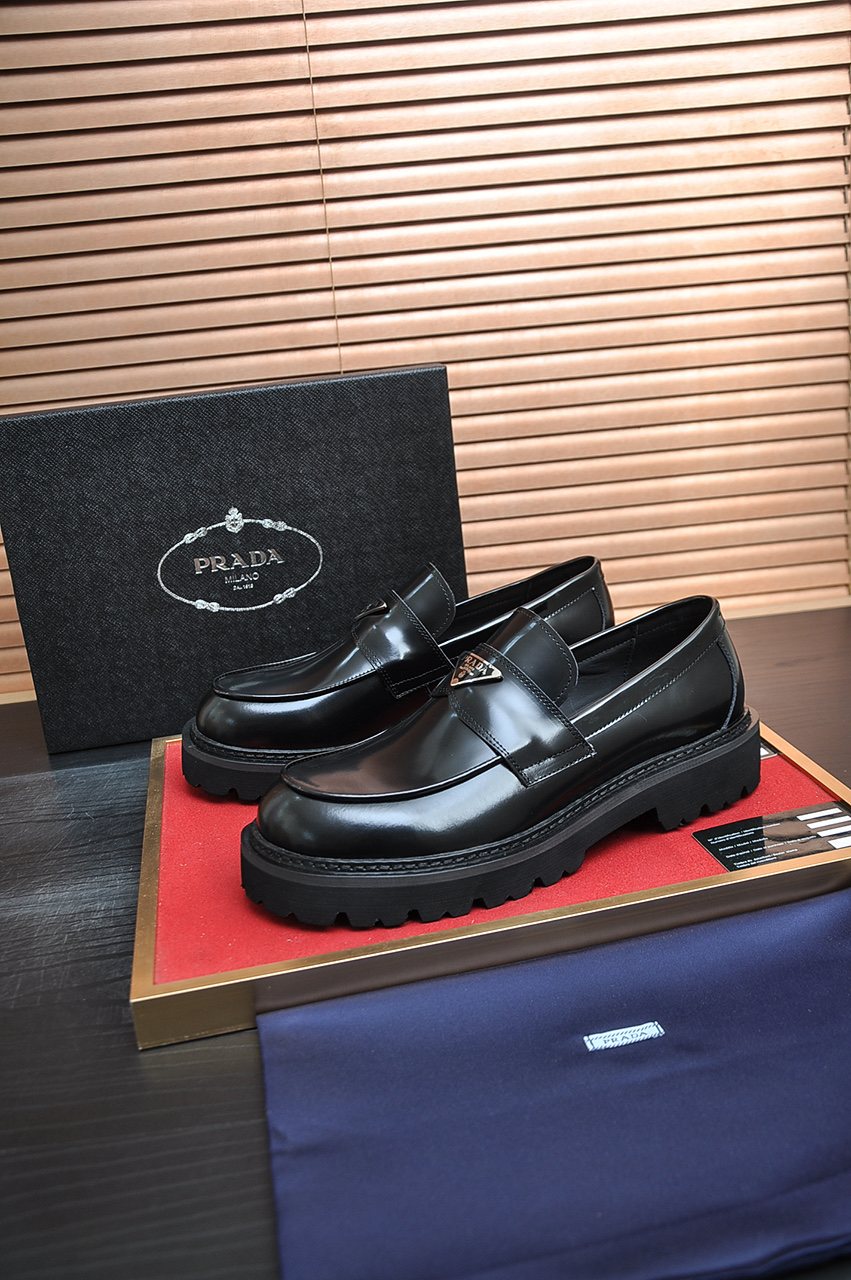 Prada Lug-Sole Strap Loafers