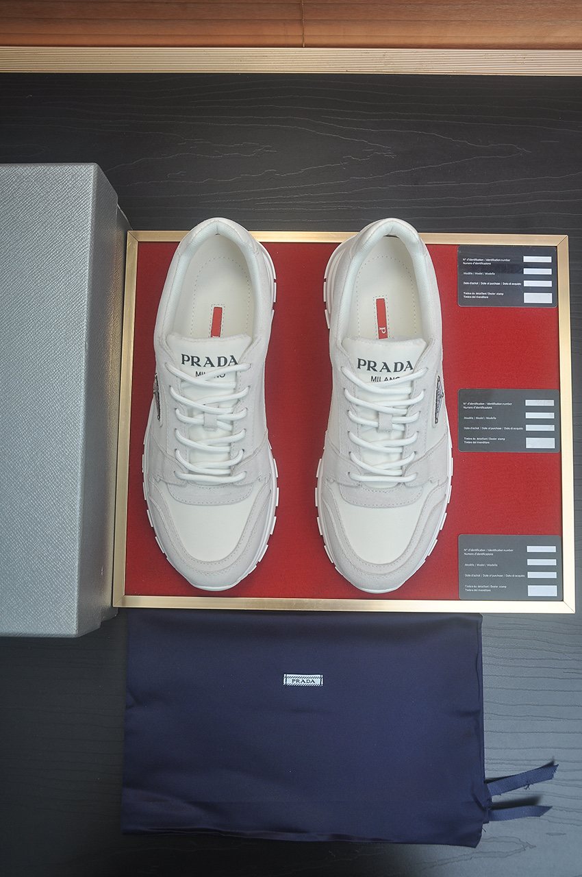 Prada Triangle Plaque Low-Top Sneakers - Lace-Up Closure