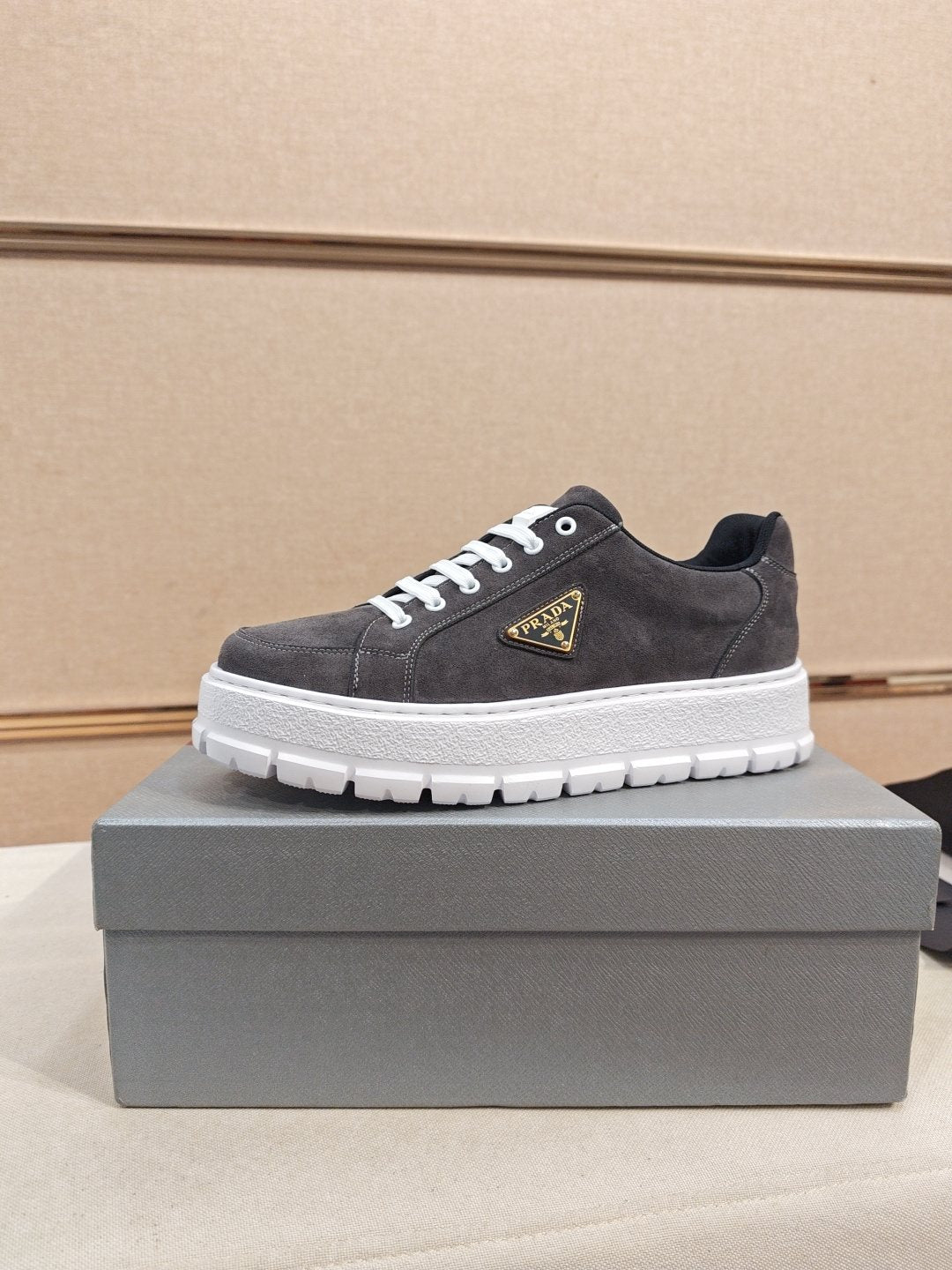 Prada Triangle Plaque Low-Top Sneakers - Lugged Outsole