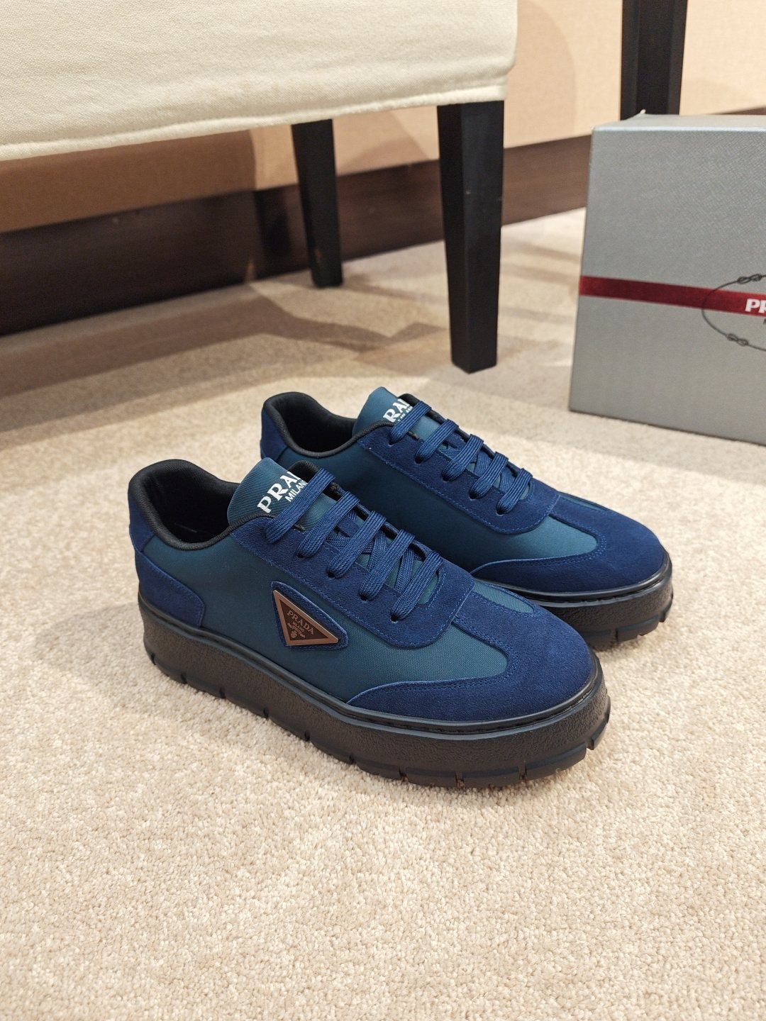 Prada Triangle Plaque Low-Top Sneakers - Lugged Outsole